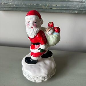 Vintage musical rotating Santa Claus